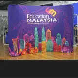 Tension fabric backdrop with a skyline print for an Education Malaysia event